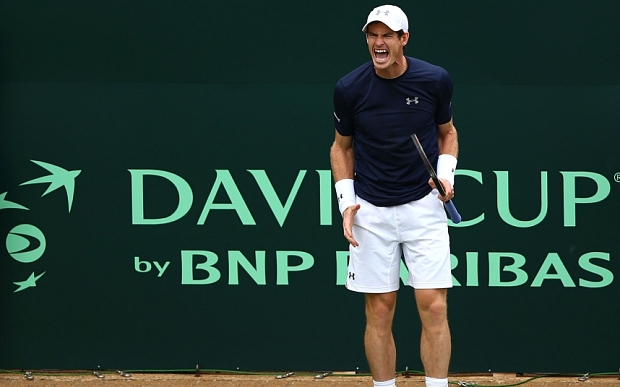 LONDON, ENGLAND - JULY 17: Andy Murray of Great Britain celebrates in his match against Jo-Wilfried Tsonga of France during Day One of the World Group Quarter Final Davis Cup match between Great Britain and France at Queens Club on July 17, 2015 in London, England. (Photo by Clive Brunskill/Getty Images)